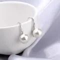 Elegant 925 sterling silver hook earrings with round white pearls on silk background - White Pearl (1051) / 12mm / Silver
