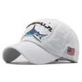White washed cotton baseball cap with embroidered shark and US flag patch detail - White