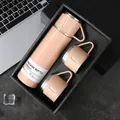 Detailed view of peach pink 500ml vacuum bottle gift set in elegant black box - 500ml / Pink