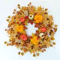 Detailed view of autumn wreath featuring maple leaves vibrant sunflowers and mini pumpkins - Autumn Wreath / 66cm