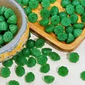 Detailed macro shot of green lotus pod glass beads for DIY jewelry projects 10x6mm - Lotus Pod Shape (L917) / Green