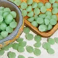 Macro shot of light green lotus seed pod glazed glass beads for handmade jewelry DIY crafts - Lotus Pod Shape (L919) / Light Green