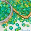 Nahaufnahme von 10x6mm grünen und gelben Lotusblüten-Glasperlen für DIY-Schmuckherstellung - Lotuskapselform (L923) / Gelbgrün