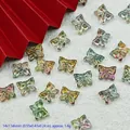 Macro detail of iridescent butterfly glass beads for DIY jewelry making 14x11mm - L833# Dawn Aurora [Lampwork Butterfly]