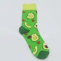 Green cotton crew socks featuring cute cartoon avocado patterns and small red hearts - One Size / Green Avocado