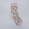 Detailed view of soft pink mid-calf socks featuring a cute all-over avocado pattern - One Size / Pink Avocado