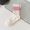 White mid-calf ribbed socks featuring pink and green stripes for women's street style - One Size / White Pink