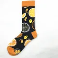 Unisex long cotton crew socks featuring a vibrant orange fruit pattern on black base - Black Orange (1511C)