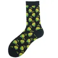 Black mid-calf crew socks featuring a vibrant lime and lemon slice repeating pattern - One Size / Black Lemon