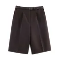 Front view of brown wide-leg high-waisted shorts featuring a snakeskin belt detail - XS / Bottoms / Coffee