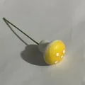 Miniature yellow spotted foam mushroom ornament featuring a flexible green wire stem - Yellow