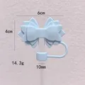 Detail view of a 10mm light blue silicone bow straw cover showing dimensions and weight. - Light Blue
