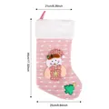 Decorative pink knit Christmas stocking with 3D snowman and size dimensions shown - Knitted Dotted Snowman Style / 44x25cm