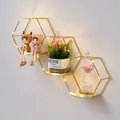 Mensola a muro esagonale dorata per decorazione creativa e organizzazione casa - Triplo Esagono Inclinato / Oro