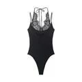 Detailed view of elegant black halter neck lace bodysuit with intricate floral patterns - XS / Tops / Black
