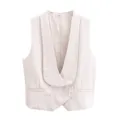 Detail view of an elegant cream-white shawl lapel women's cropped suit vest for fashion - XS / Tops / White