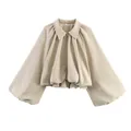 Vue détaillée d'un blouson aviateur beige à manches ballon avec col rabattu chic. - S / Hauts / Kaki