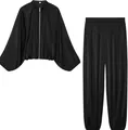 Elegant black satin two-piece outfit featuring a puff sleeve bomber jacket and lantern pants - S / Top And Bottom / Black