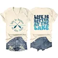 Women's V-neck T-shirt showing front and back prints with Life is Better at the Lake theme - S / Tops / Sand