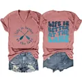 Women's V-neck T-shirt featuring 'Life is better at the lake' graphic, front and back view - Rose Gold