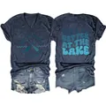 Front and back detail of a navy heather V-neck tee with 'Life is Better at the Lake' print. - Navy Blue