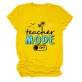 Vista detallada de una camiseta amarilla de mujer con el diseño Teacher Mode Off - S / Tops / Amarillo (Texto Negro)