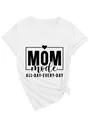 Macro detail of 'MOM mode ALL DAY EVERY DAY' graphic print on a white cotton V-neck T-shirt - S / Top (3812) / White (Black Font)