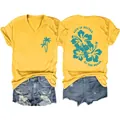 Detail of yellow V-neck tee featuring Life is Better at the Beach graphic and hibiscus flowers - S / Tops / Yellow