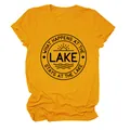 Mustard yellow women's crew neck T-shirt with 'What Happens At The Lake' slogan graphic - S / Tops / Mustard Yellow (Black Font)