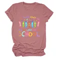 Detailed view of a mauve T-shirt featuring a 'Get Your Cray On' crayon graphic print. - S / Tops / Rose Gold