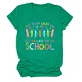 Detail view of green 'Get Your Cray On' t-shirt with colorful school crayon print - S / Tops / Dark Green
