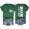 Close-up of green V-neck T-shirt with Senior MOM 2027 back print and denim shorts - Vintage Green (White Font)