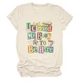 Cream graphic t-shirt featuring I Closed My Book To Be Here letter-patch design - S / Tops / Sand
