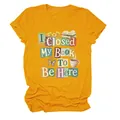 Detailed view of the creative text print on a yellow crewneck short sleeve T-shirt - S / Tops / Mustard Yellow