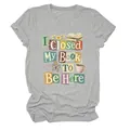 Close-up detail of the 'I Closed My Book To Be Here' colorful graphic on a gray T-shirt - S / Tops / Light Gray