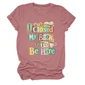 Detail of dusty pink T-shirt with 'I Closed My Book To Be Here' graphic print - S / Tops / Rose Gold