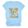 Detailed macro view of light blue crew neck T-shirt with vintage book lover print - S / Tops / Light Blue