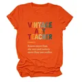Λεπτομερής άποψη της γραφικής εκτύπωσης Vintage Art Teacher σε πορτοκαλί γυναικείο μπλουζάκι - S / Tops / Πορτοκαλί