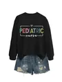 Detailed macro view of black pediatric nurse sweatshirt paired with denim ripped shorts - S / Tops / Black Sweatshirt (White Text Pattern)