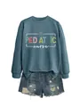 Women's blue pediatric nurse crewneck sweatshirt styled with distressed denim shorts - S / Tops / Blue (White Graphic)