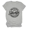 Detail van de Sarcastic Sunshine-afbeelding op een grijs T-shirt met korte mouwen en ronde hals - S / Tops / Lichtgrijs