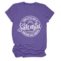 Detailweergave van een paars dames-T-shirt met een witte Sarcastic Sunshine-opdruk - S / Tops / Paars