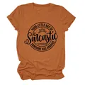 Detailweergave van oranje Sarcastic Sunshine grafisch T-shirt van zacht katoen - S / Tops / Gebrand Oranje (Zwart Lettertype)