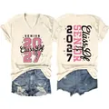 Detailed view of a white women's V-neck T-shirt with a pink glitter Senior 2027 print - S / Tops / Sand