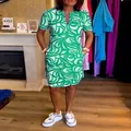 Detail view of a women's summer short-sleeved V-neck dress with green abstract print - S / Dresses / Green Floral