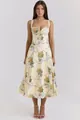 Front view of a floral spaghetti strap midi dress with yellow roses and blue ribbons - Champagne