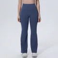 Close-up detail of high-waist breathable flared yoga pants in professional dusty blue - S / Bottoms / Navy Blue