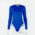 Cobalt blue long-sleeved tight bodysuit for women displayed on a clear mannequin torso - S / Tops / Blue