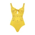 Detailed macro view of yellow one-piece swimsuit with floral laser-cut hollow patterns. - S / Tops / Yellow