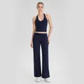 Marineblauw halter-yogaset met wijde sportbroek voor pilates- en sportschoolsessies. - S / Top en Broek / Marineblauw